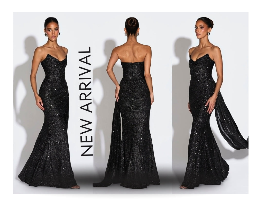 Model wearing the Ashika Maxi Dress showing off the elegant movement of the mesh skirt with integrated godets