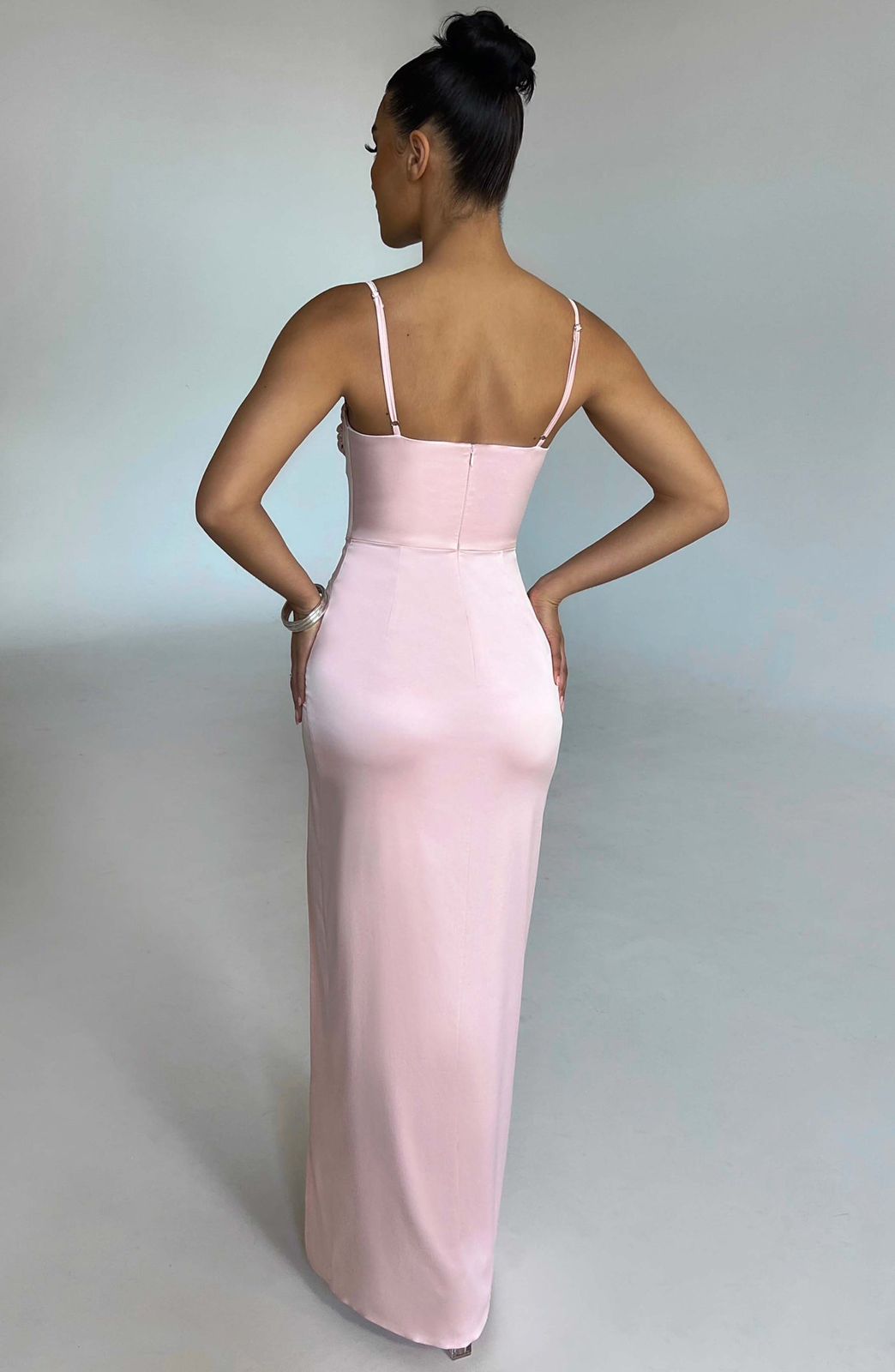 Back view of the Alora Maxi Dress featuring a sophisticated low-back design and floor-length hem
