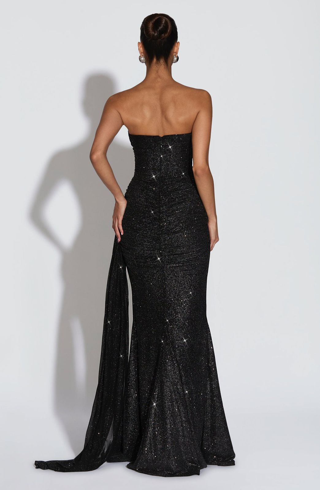 Back view of the Ashika Maxi Dress highlighting the silhouette, strap alignment, and zipper detail.