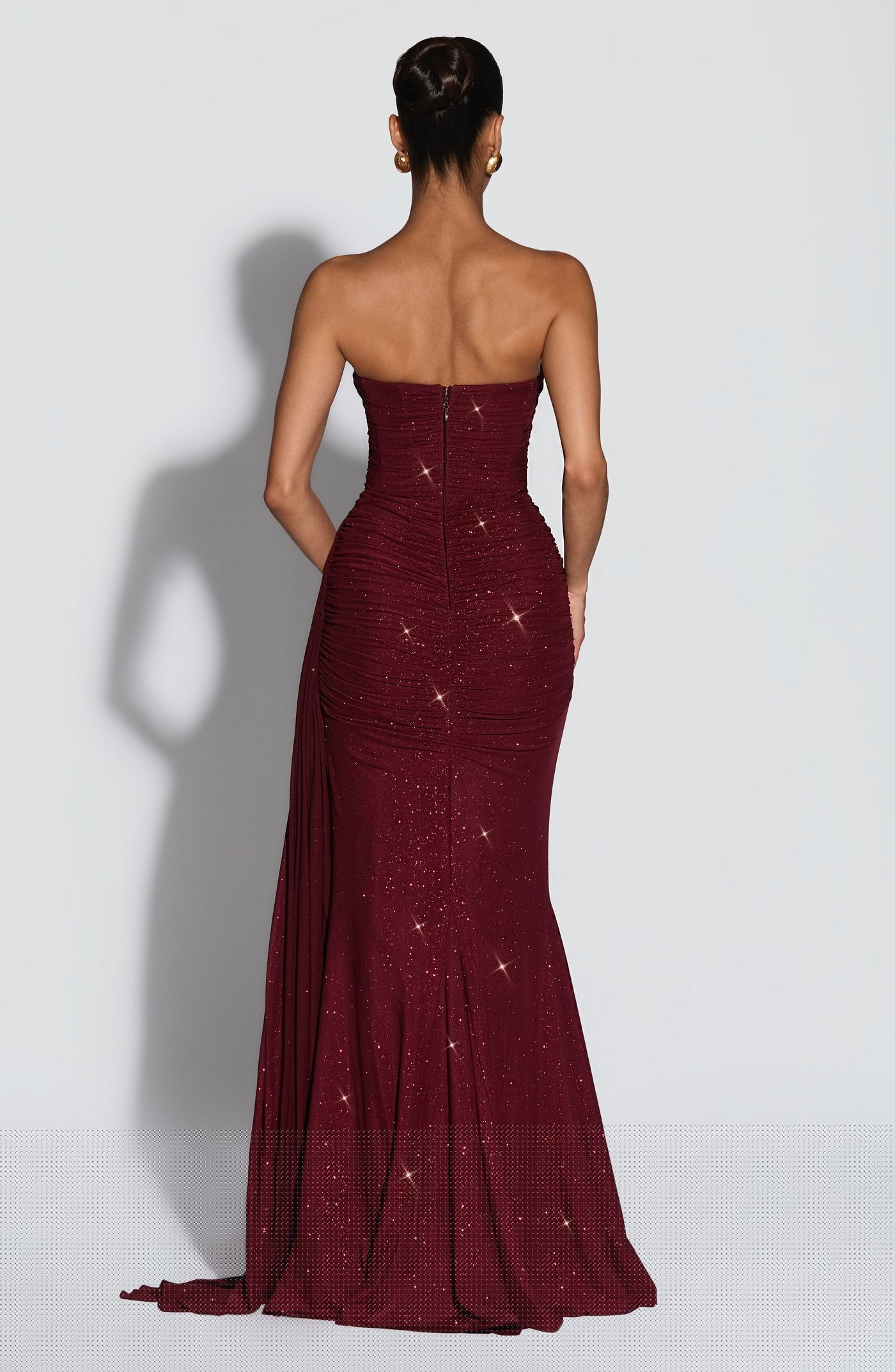 Back view of the Ashika Maxi Dress highlighting the silhouette, strap alignment, and zipper detail