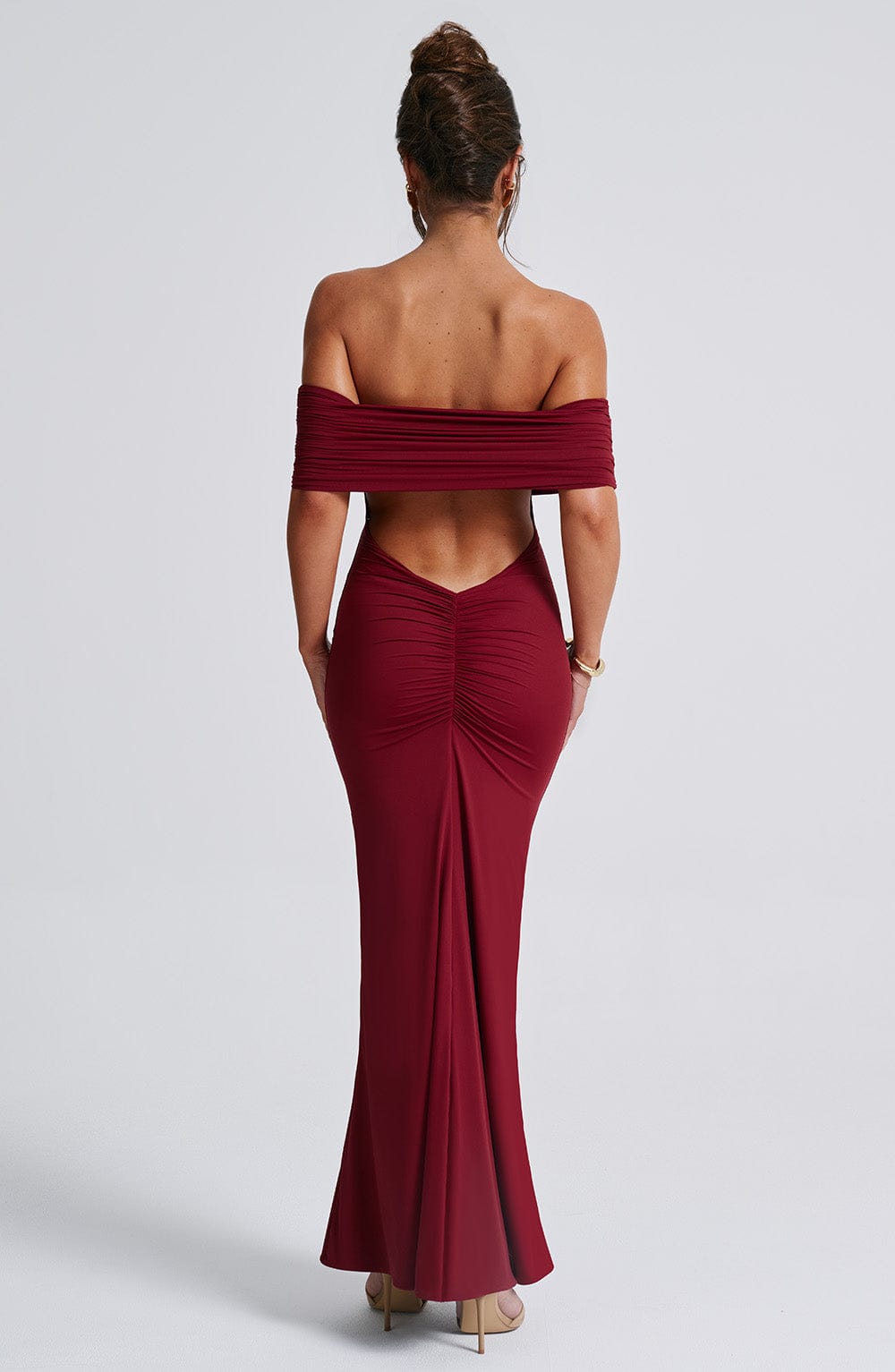 Burgundy off-shoulder gown on red dress back side