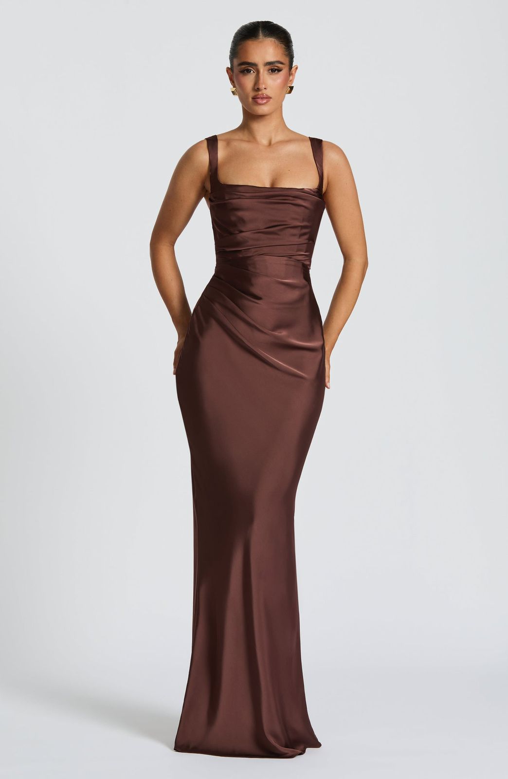 Calanthe Maxi Dress in Emerald brown satin by Qorsage - A floor-length formal gown featuring a square neckline and pleated bodice