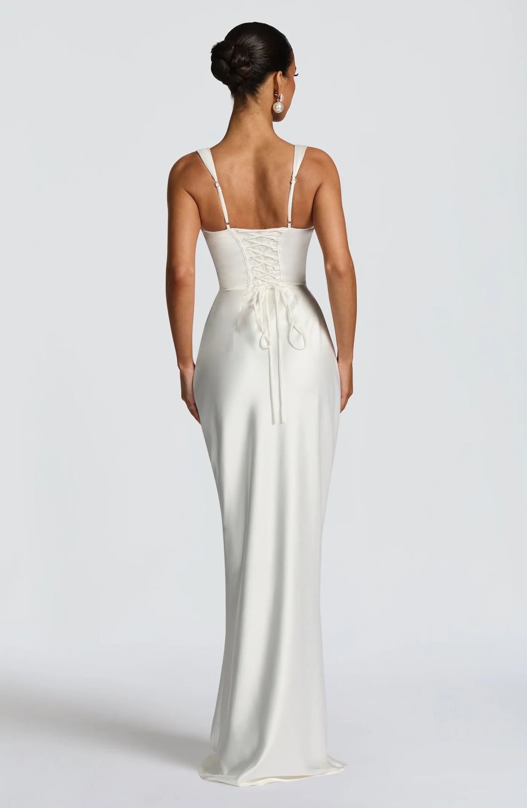Back view of Calanthe maxi dress with lace-up detail and tapered straps