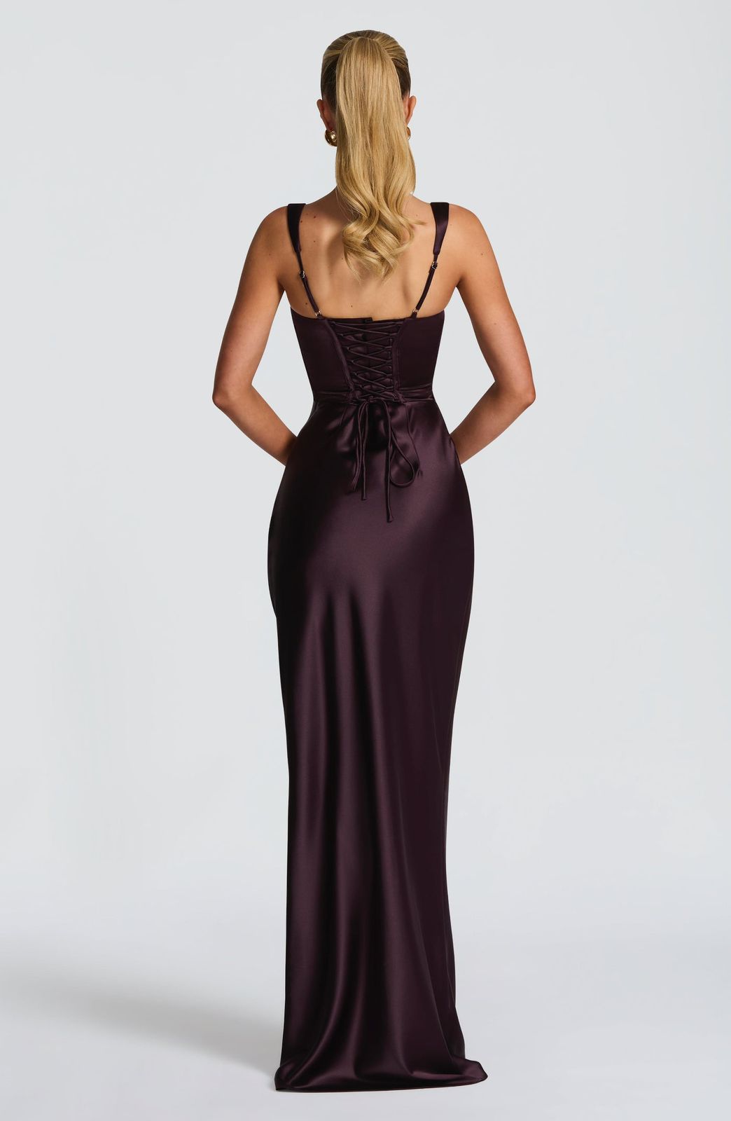Close-up of the adjustable lace-up corset back on the Calanthe Maxi Dress, showing the elegant tie detail and tailored fit
