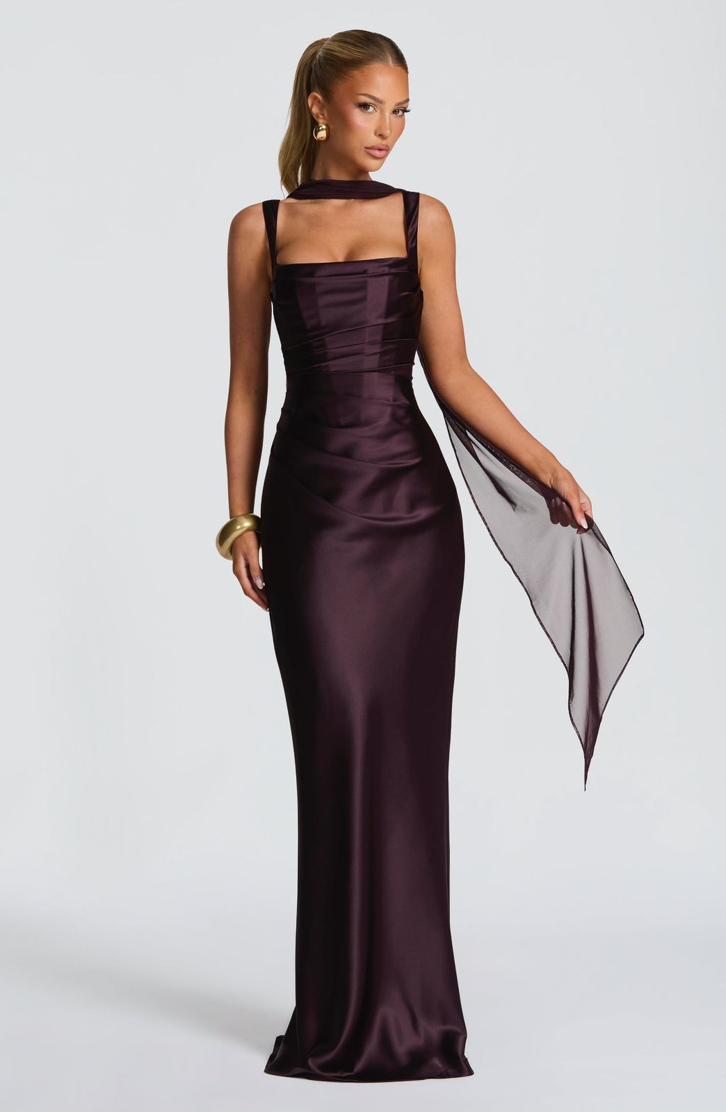 Calanthe Maxi Dress in Emerald Purple Satin by Qorsage - A floor-length formal gown featuring a square neckline and pleated bodice