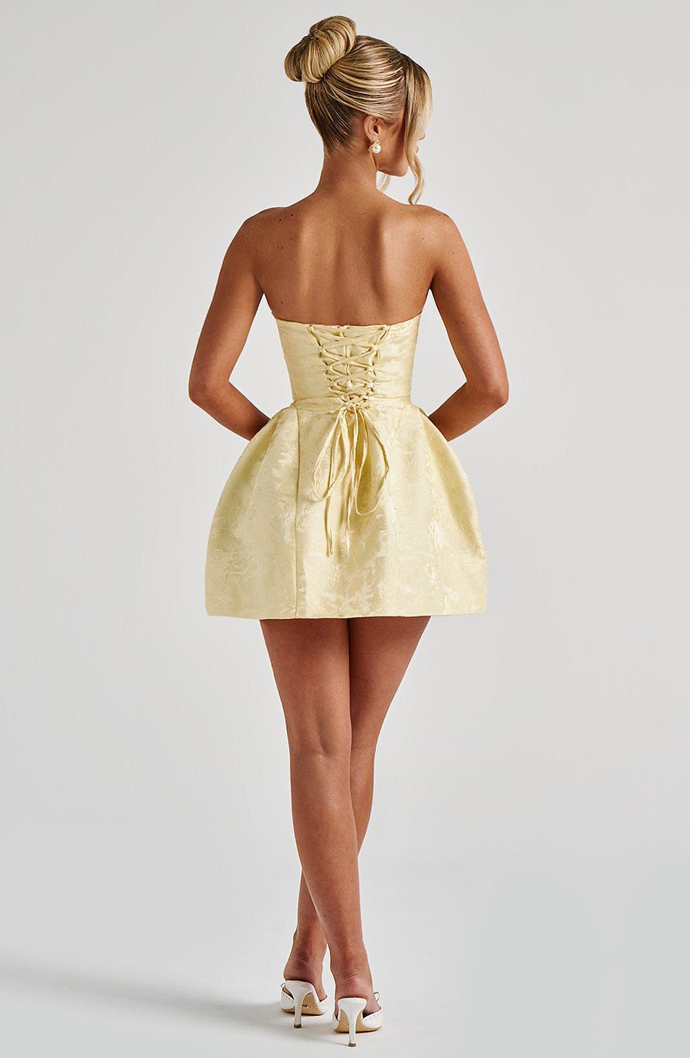Elenora Mini Dress by Qorsage, styled as a chic cocktail or party outfit