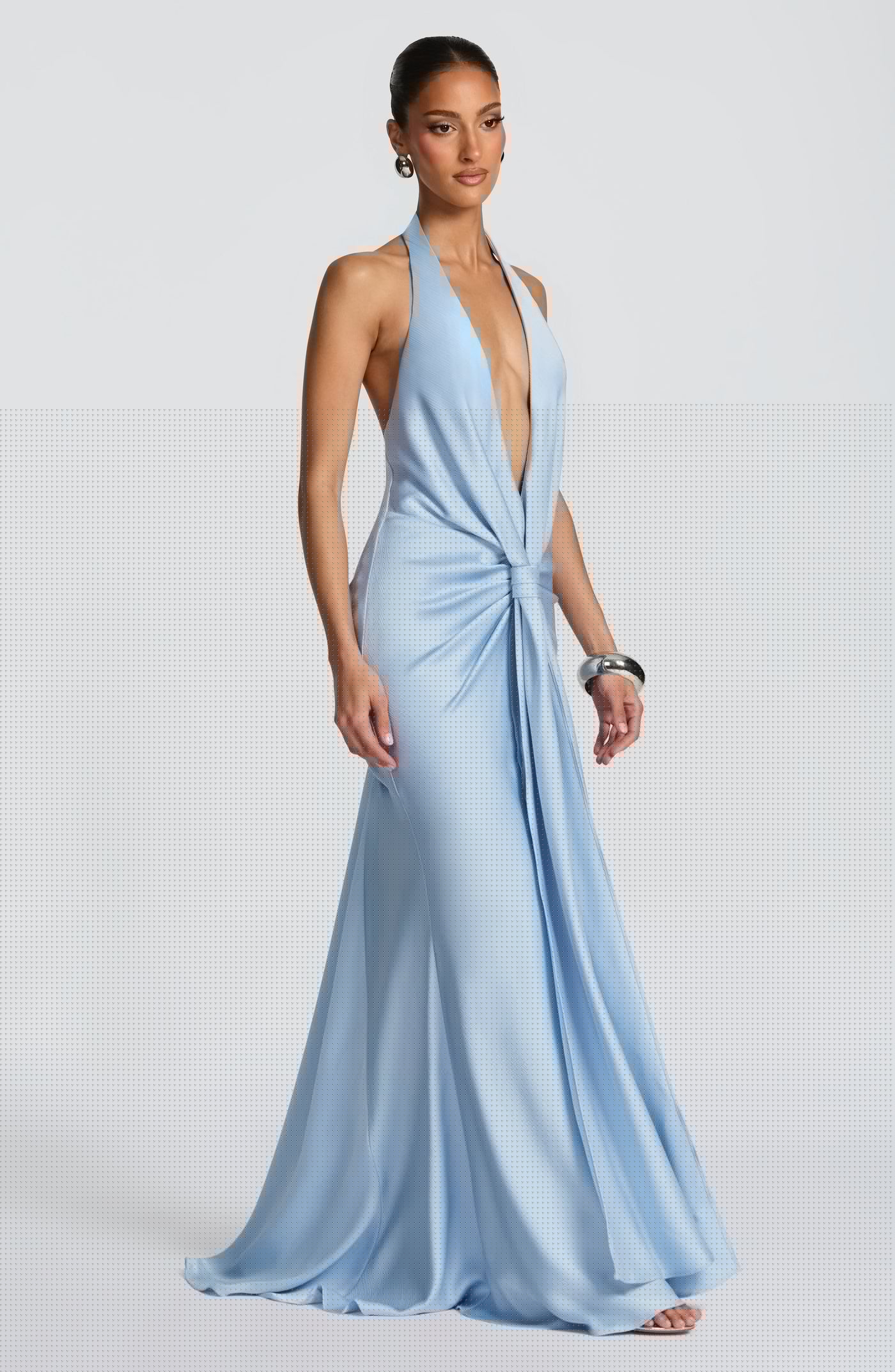 Side profile of the Linette Maxi Dress showcasing the cascading skirt and elegant silhouette