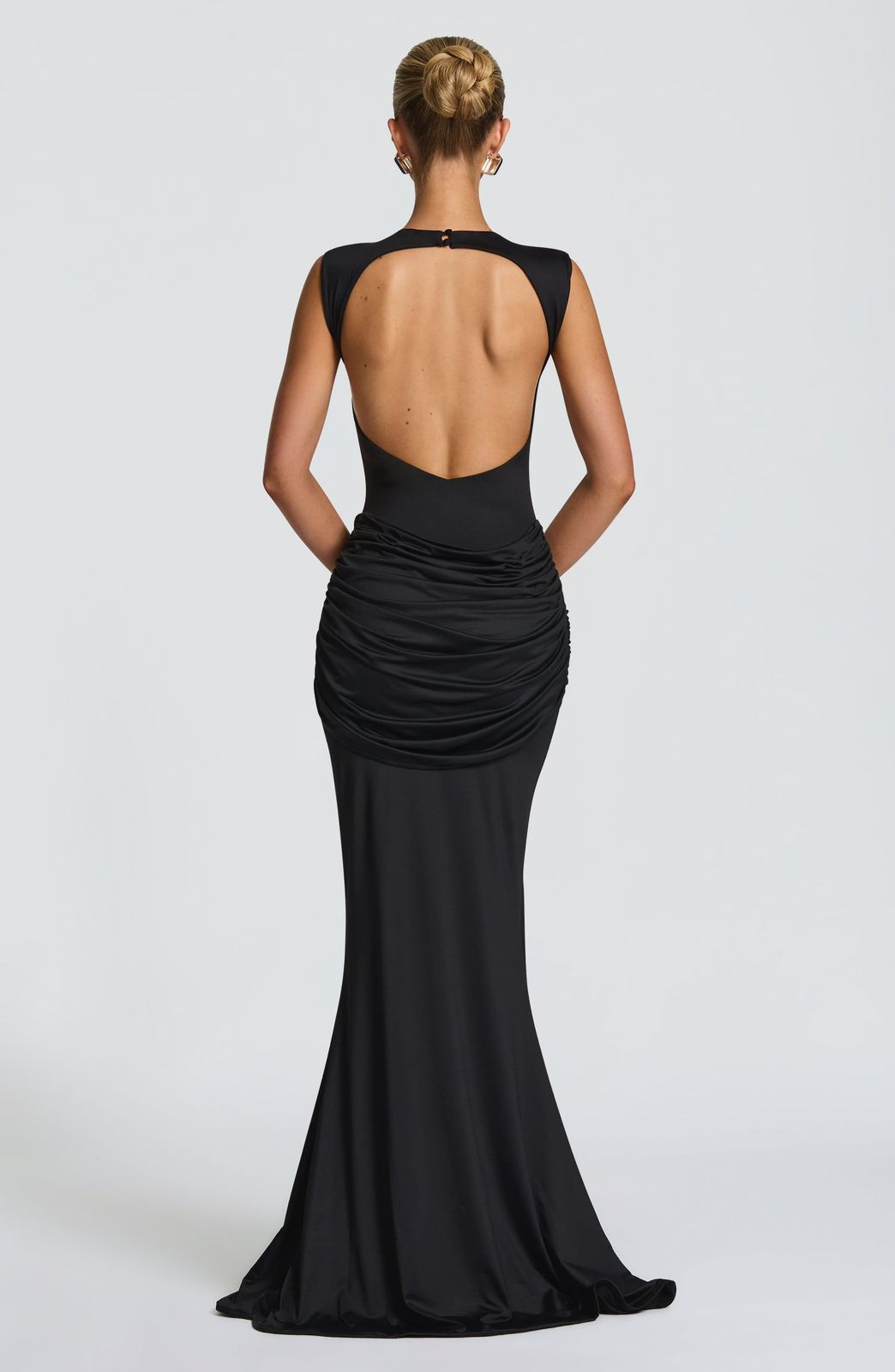 Back view of the Lorenza Maxi Dress showing the open keyhole design and double-button neck closure