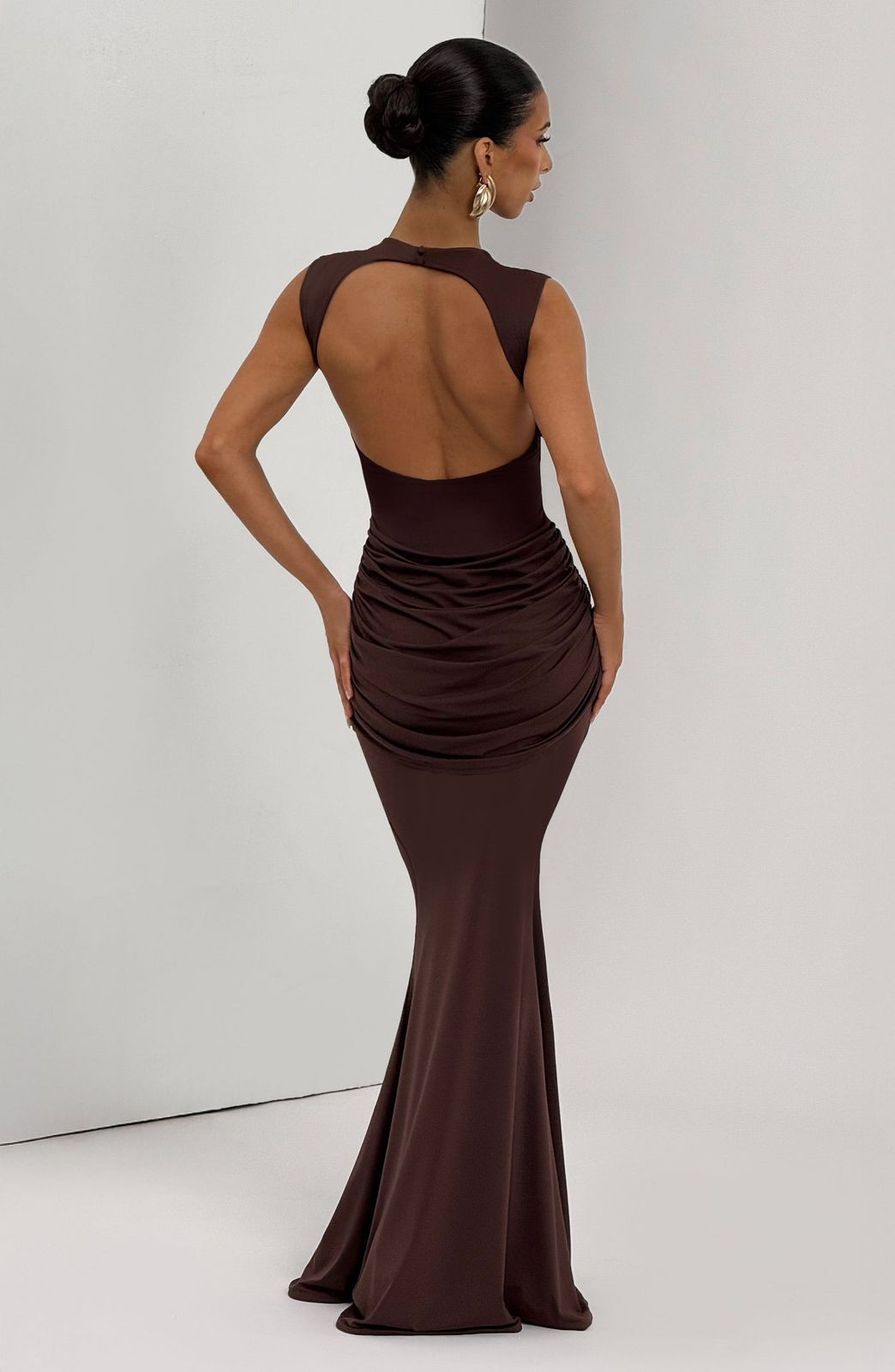 Back view of the Lorenza Maxi Dress showing the open keyhole design and double-button neck closure