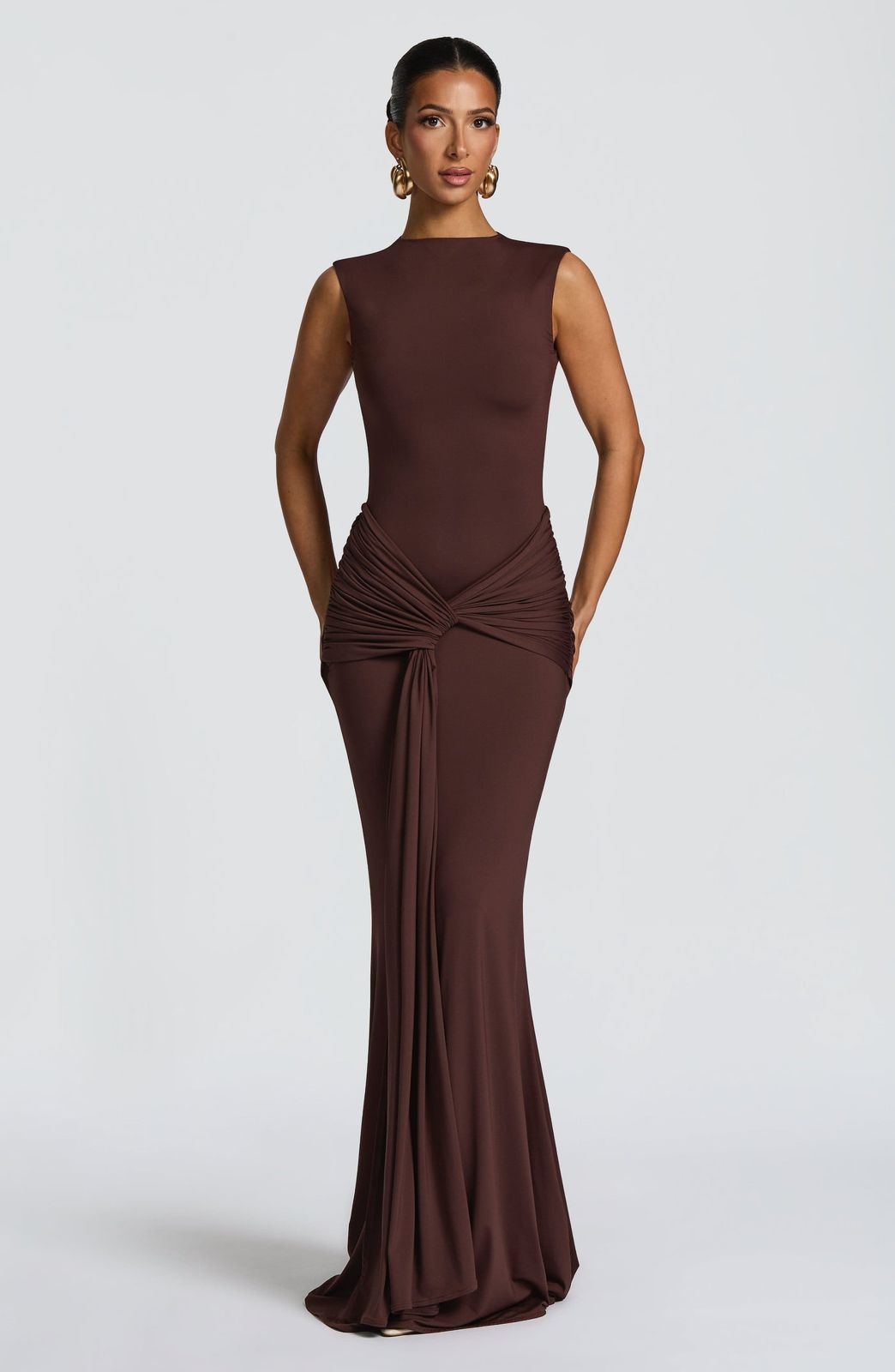 Lorenza Maxi Dress in Plum Brown, styled as an elegant evening gown for formal events