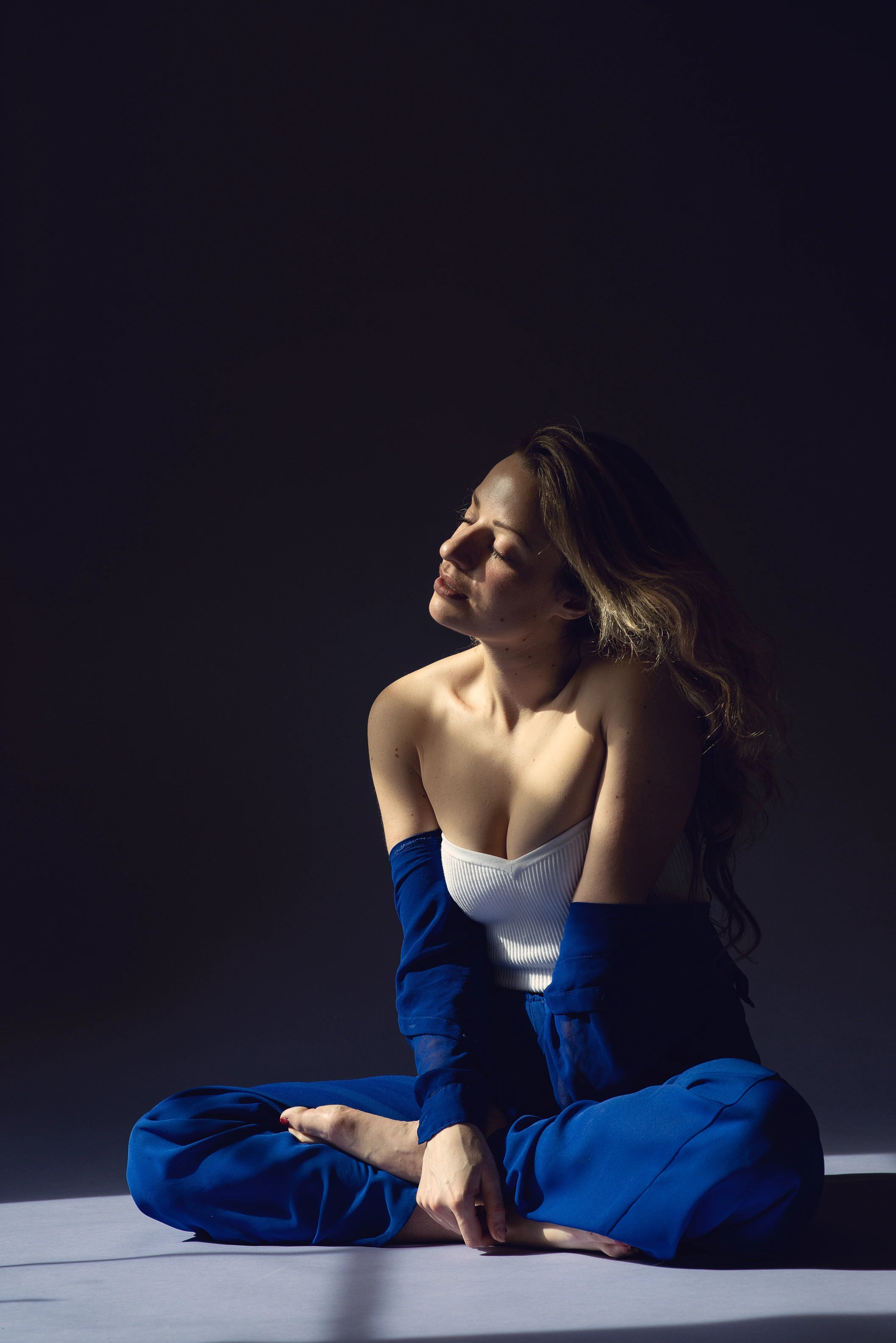 woman-cross-legged-with-her-eyes-closed